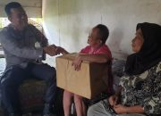 Kapolsek Andoolo Beri Bantuan kepada Penyandang Disabilitas