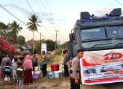 Polres Konsel Beri Bantuan Air Bersih dan Sembako kepada Warga Desa Watu Merembe