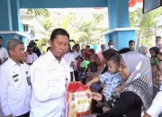 Disdalduk dan KB bersama Baznas Kota Kendari Salurkan Bantuan Penanganan Stunting kepada Ratusan Baduta
