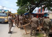 PKL yang Berjualan di Atas Drainase Depan Pasar Lapulu Ditertibkan