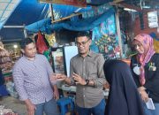 Polres dan KCP Bulog saat Sosialisasi Harga Beras Subsidi di Pasar Tadoha