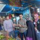 Polres dan KCP Bulog saat Sosialisasi Harga Beras Subsidi di Pasar Tadoha