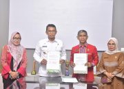 Penandatangan MoU untuk percepatan sertifikat aset tanah oleh Pj Wali Kota Baubau dan Kepala BPN Kota Baubau