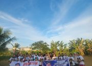 Kelompok Emak-Emak Gemoy Kendari Pendukung Yudhianto Bersihkan Lingkungan Rawan Banjir