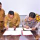 Penandatangan NPDH oleh Pj Wali Kota Baubau dan Kapolres Baubau