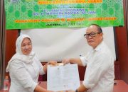 Pj Bupati Harmin Ramba Tandatangani NPHD Penyaluran Beasiswa Bagi Mahasiswa Asal Konawe di Jakarta