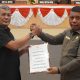 Penyerahan dokumen rancangan KUA dan PPAS Tahun Anggaran 2025 Kota Kendari oleh Pj Wali Kota, Muhammad Yusup kepada Ketua DPRD Kota Kendari, Subhan