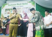 PJ Bupati Konawe Harmin Ramba Bagikan Santunan Anak Yatim di Tongauna Utara