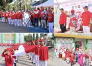 Kirab Kebangsaan Kemenag Sultra Diwarnai Pembentangan Kain Merah Putih 79 Meter dan Orasi Kebangsaan