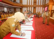 Pj Gubernur Sultra Teken Kesepakatan Bersama 17 Kabupaten/Kota Dalam Peningkatan PAD dari Sektor Pajak Daerah