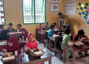 Polres Konsel Bagikan Makanan Bergizi Gratis kepada Murid TK Anasepu Sisoro