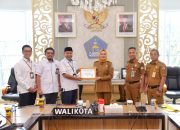 Wali Kota Kendari Terima Hasil Penilaian Kepatuhan Penyelenggaraan Pelayanan Publik Tahun 2024 dari Ombudsman RI
