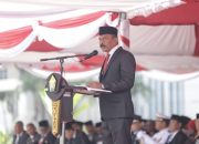 Pemprov Sultra Rayakan Harvetnas dan HUT RI ke-80 dengan Launching Pembagian Bendera Merah Putih