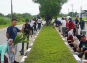 Wujudkan Kota yang Bersih dan Indah, Sekretariat DPRD Kendari Lakukan Pembersihan Lingkungan dan Cat Trotoar