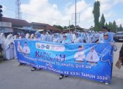 Memukau di Pawai Ta’aruf MTQ Sultra 2026, Kafilah Kota Kendari Tampil Elegan dengan Tenun Khas Daerah